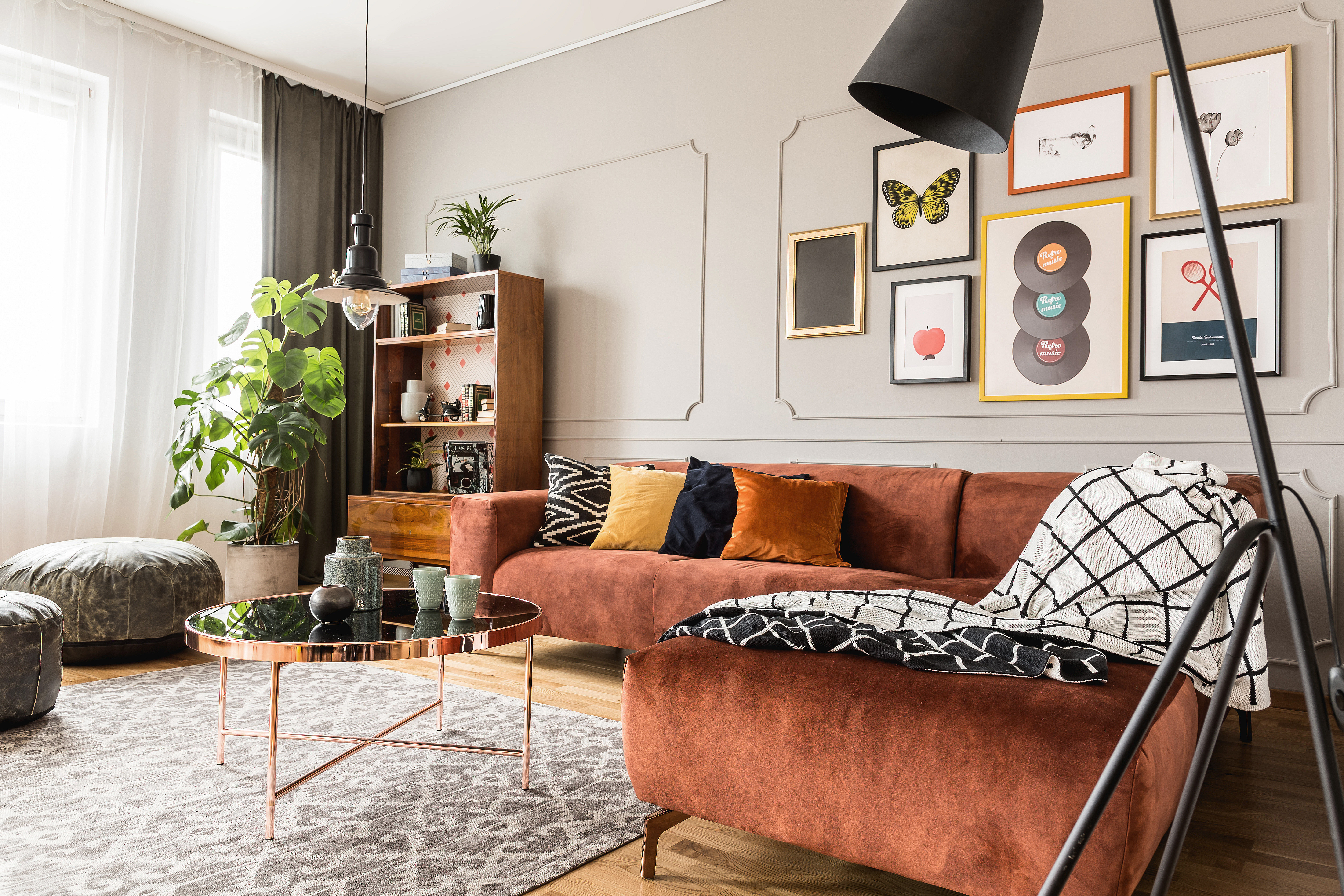 Modern eclectic living room with contemporary furniture and artistic design elements